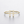 Gold ring with letter 'H' design on a light gray background