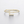 Gold bracelet with diamond accents on a light gray background