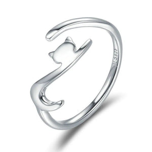 Silver cat-shaped ring on a white background