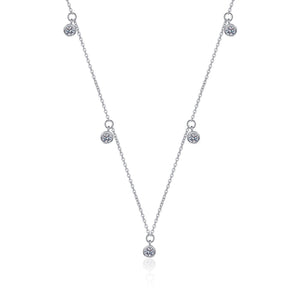 Silver necklace with small round pendants on a white background