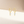 Gold hoop earrings with star-shaped opalite stones on a beige background