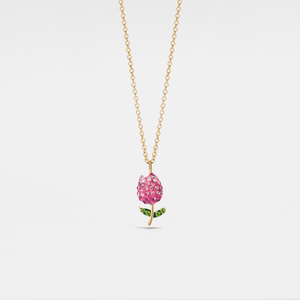 Gold necklace with a pink flower pendant on a white background