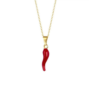 Red chili pepper pendant on a gold chain against a white background