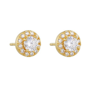 Gold earrings with clear gemstones on a white background
