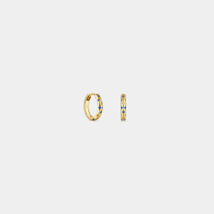 Gold hoop earrings with embedded stones on a light gray background