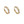Pair of gold hoop earrings with small diamonds on a white background