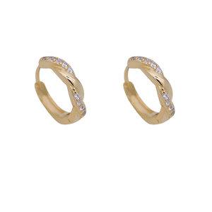 Pair of gold hoop earrings with small diamonds on a white background