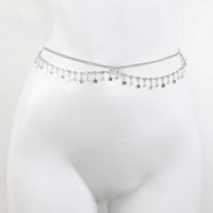 Silver star-shaped belly chain on a mannequin against a white background