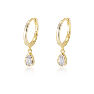 Gold hoop earrings with teardrop-shaped gemstones on a white background