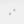Gold star-shaped earrings on a light gray background