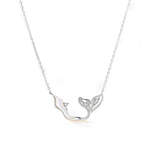 Silver necklace with a whale tail pendant on a white background