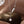 Pearl necklace with silver chain on a blurred background