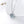 Silver necklace with a round pendant featuring blue and clear stones on a white background