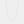 Gold necklace with small blue beads on a light gray background