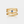 A gold-plated sterling silver ring with a central blue enamel evil eye surrounded by five interwoven bands.