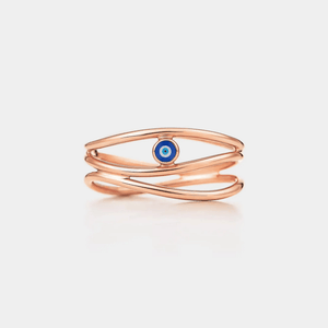 A rose gold-plated sterling silver three-row ring with a central blue enamel evil eye design.