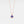 Rose gold necklace with a blue evil eye pendant on a light gray background