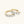Gold earring with clear gemstones on a white background