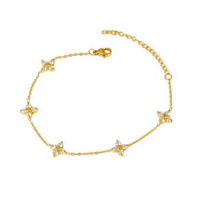 Gold bracelet with star-shaped charms on a white background