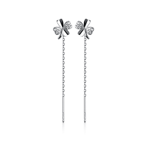 Silver bow-shaped earrings with chain drops on a white background