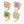 Four floral-themed rings with colorful gemstones on a white background