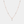 A gold-plated, sterling silver necklace with a chain design and a central four-petal flower-shaped cubic zirconia pendant.