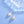 Two pearl necklaces on a light blue background