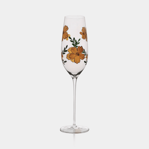 Floral-patterned champagne flute on a white background