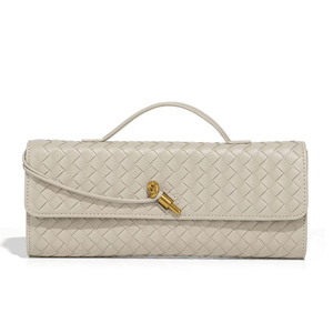 Beige woven handbag with a gold clasp on a white background