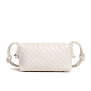 White woven handbag on a white background