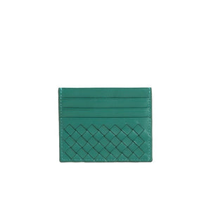 Green woven cardholder on a white background