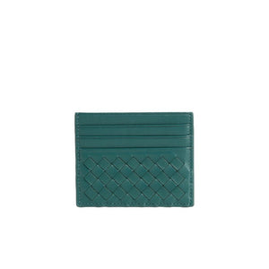 Green woven cardholder on a white background