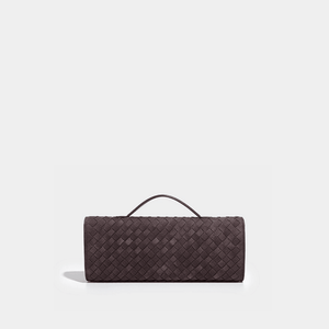 Brown woven clutch bag on a light gray background
