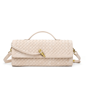 Beige woven handbag with a gold clasp on a white background
