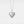 Silver heart-shaped locket with 'I love Permade' engraving on a light gray background