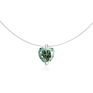 Heart-shaped green gemstone pendant on a white background