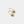 Gold heart-shaped earrings on a light gray background