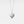 Heart-shaped locket pendant with paw print design on a chain against a light gray background