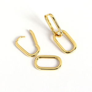 Gold hoop earrings on a white background
