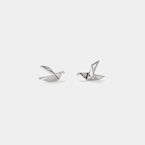 A pair of gold-plated origami crane threader stud earrings made of sterling silver with cubic zirconia.