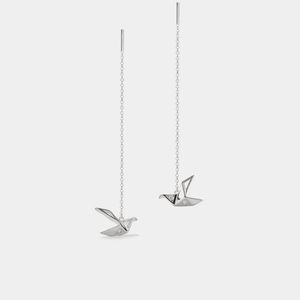 A pair of gold-plated origami crane threader stud earrings made of sterling silver with cubic zirconia.