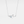 Silver sea turtle necklace with a blue gemstone pendant on a light gray background