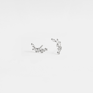 A pair of gold-plated sterling silver crawler stud earrings with laurel leaf designs.