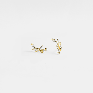 A pair of gold-plated sterling silver crawler stud earrings with laurel leaf designs.