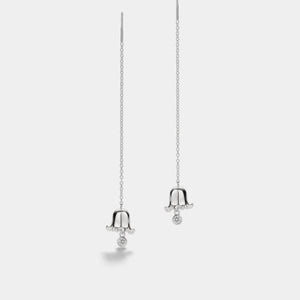 Silver bell-shaped earrings with small diamonds on a light gray background