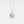 Silver necklace with a round locket featuring a fox and stars on a light gray background, inspired by 'The Little Prince'.