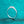 Silver ring with a diamond on a teal glittery background
