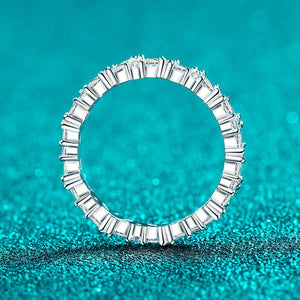 Diamond ring on a teal background