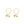 Pair of gold hoop earrings with spherical ends on a white background
