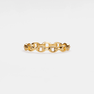 Gold chain ring on a white background
